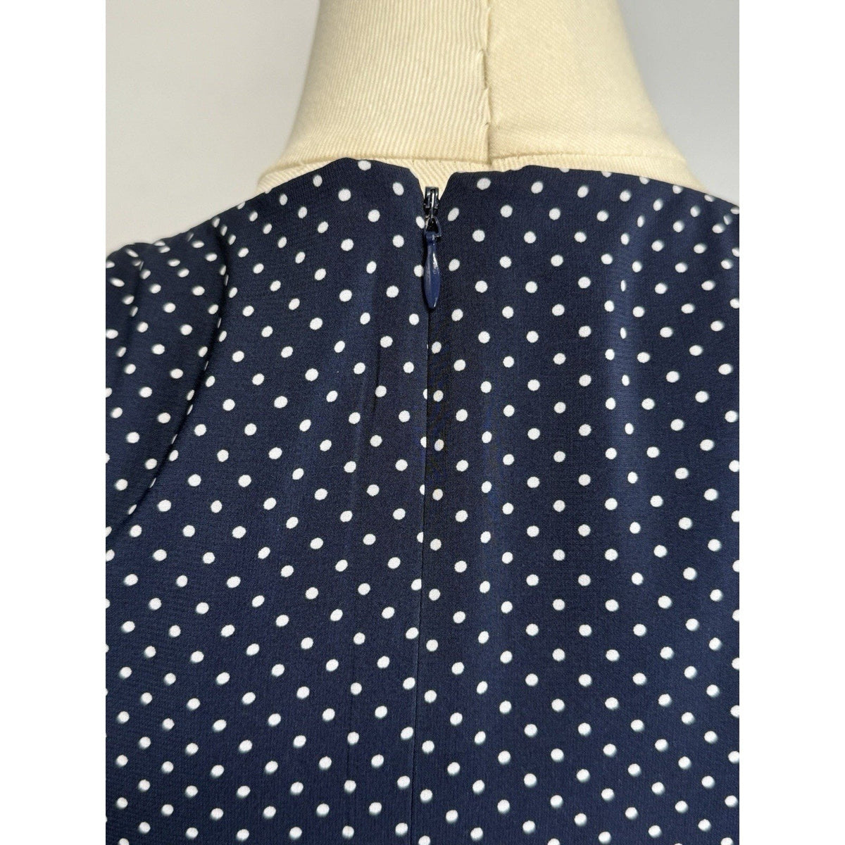 The limited Women’s Size 12 Blue polkadots sleevless Fit & Flare Faux Wrap Dress