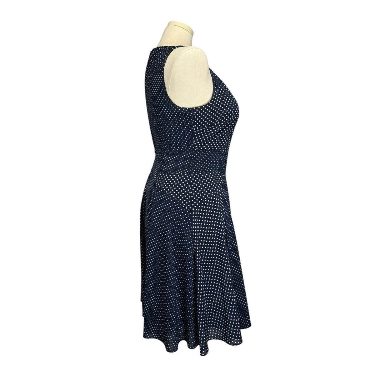 The limited Women’s Size 12 Blue polkadots sleevless Fit & Flare Faux Wrap Dress