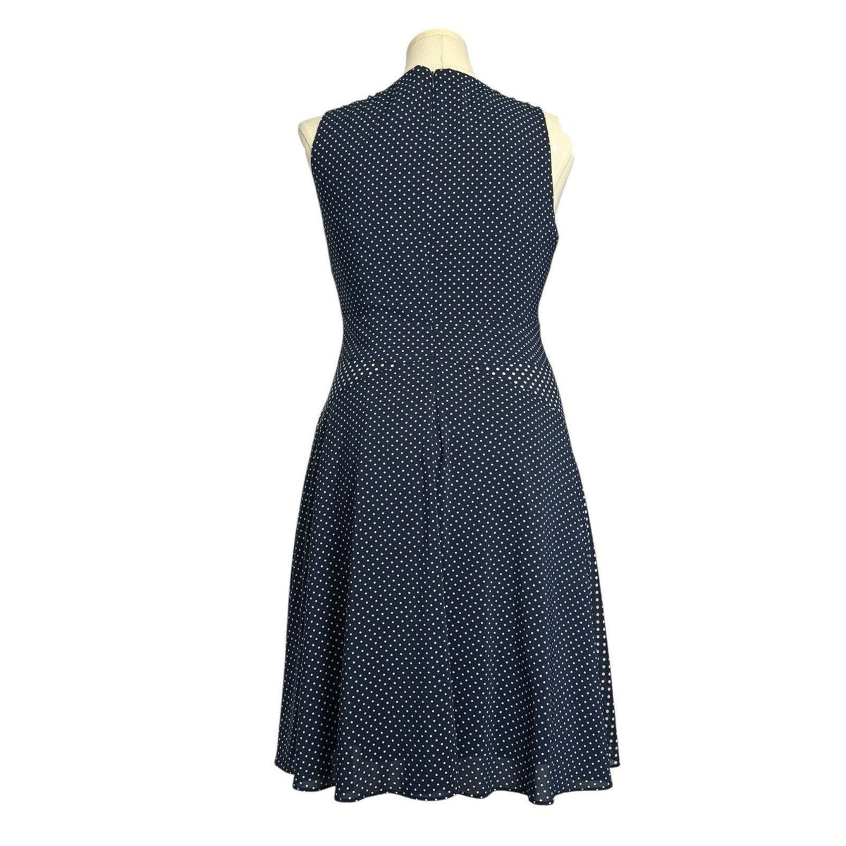 The limited Women’s Size 12 Blue polkadots sleevless Fit & Flare Faux Wrap Dress