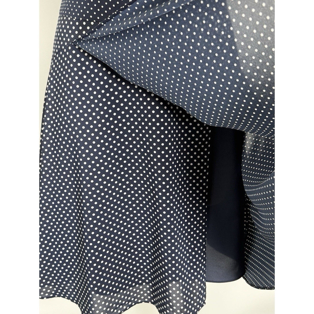 The limited Women’s Size 12 Blue polkadots sleevless Fit & Flare Faux Wrap Dress