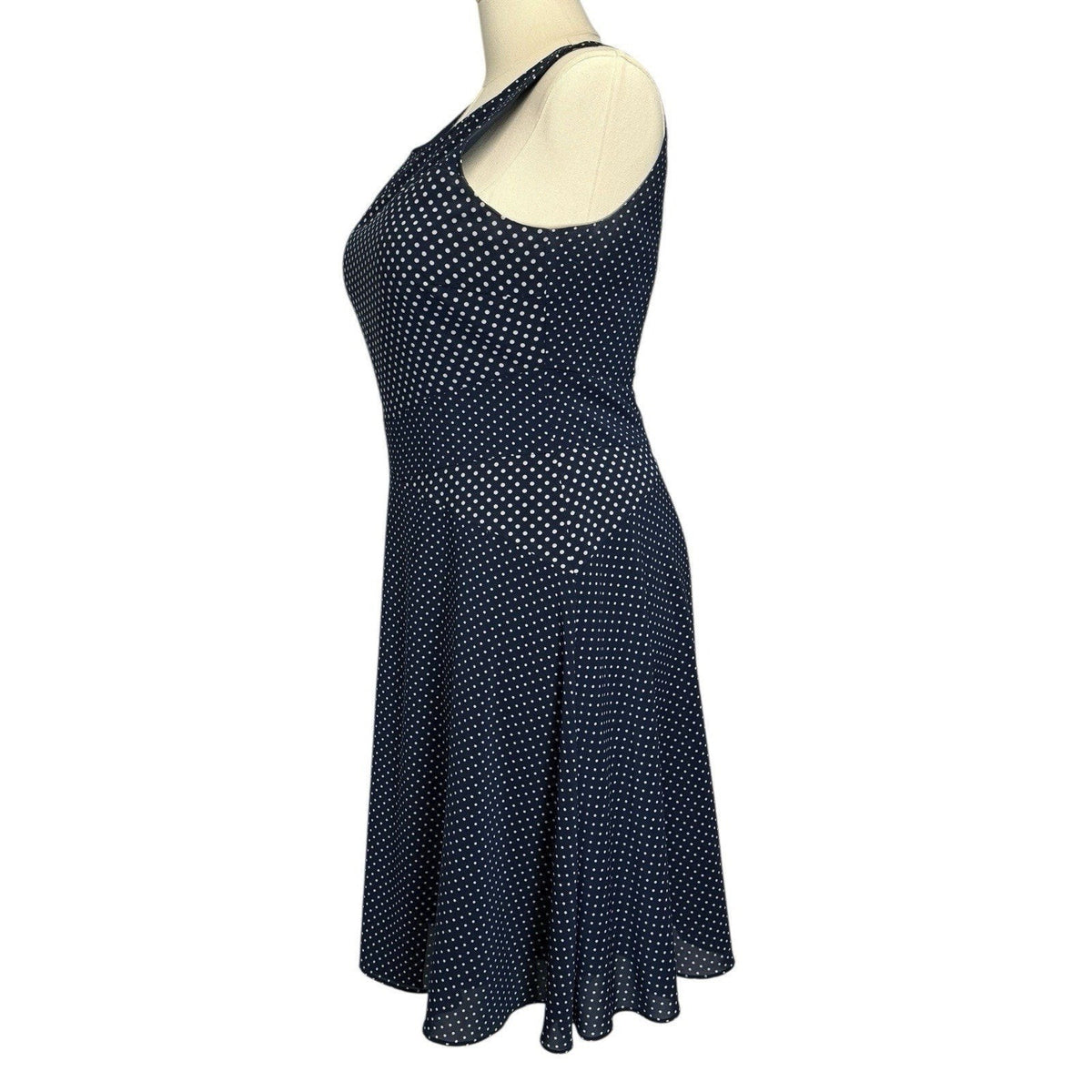 The limited Women’s Size 12 Blue polkadots sleevless Fit & Flare Faux Wrap Dress
